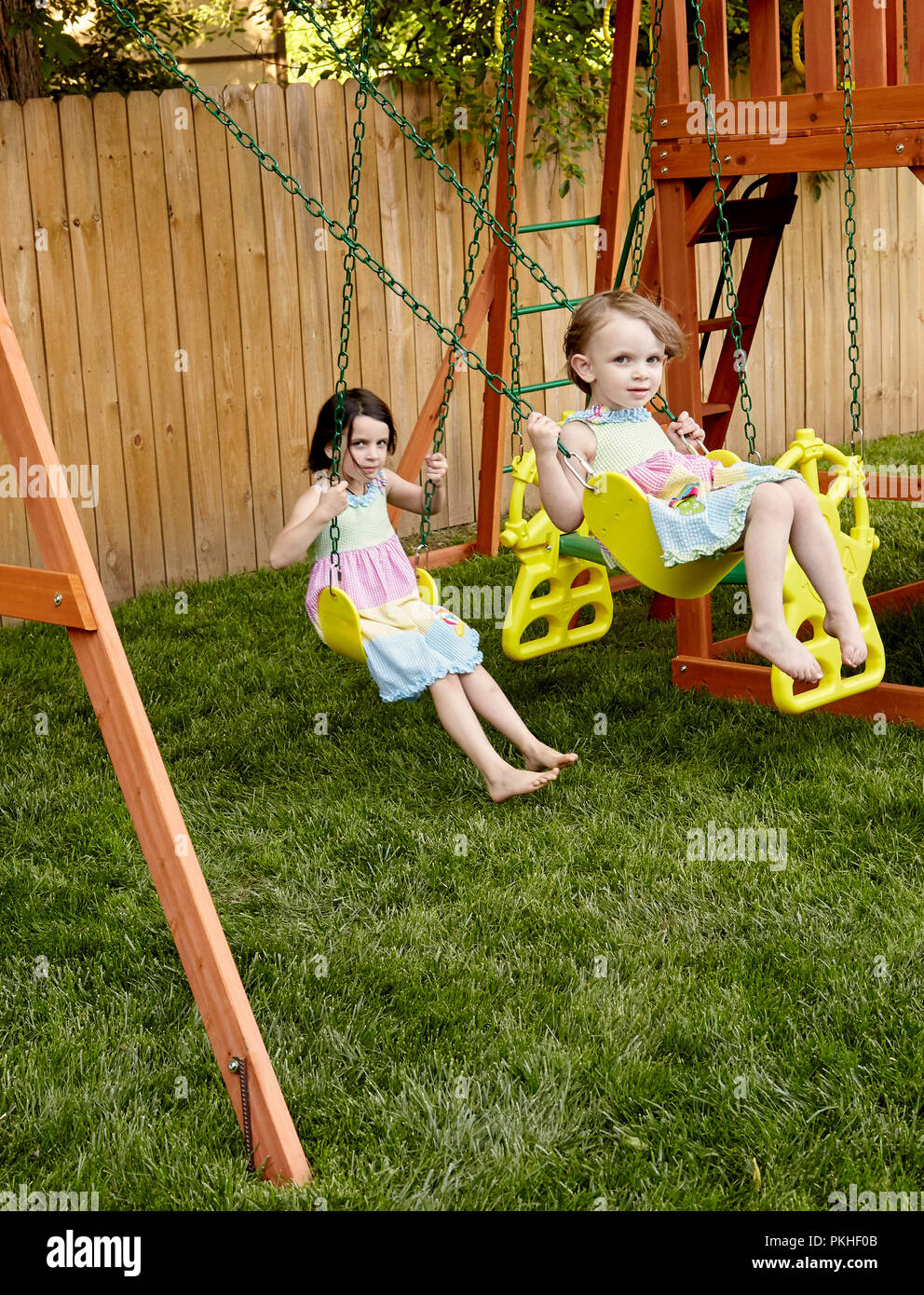 little girl playing and making funny faces Stock Photo