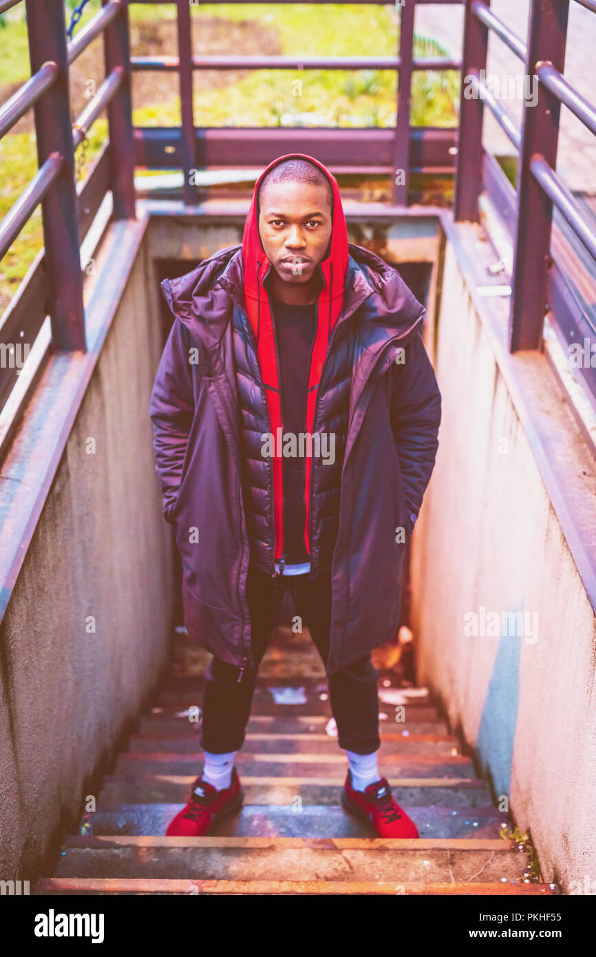 young african man outdoors posing looking camera - rebel, rude boy, swag  concept Stock Photo - Alamy