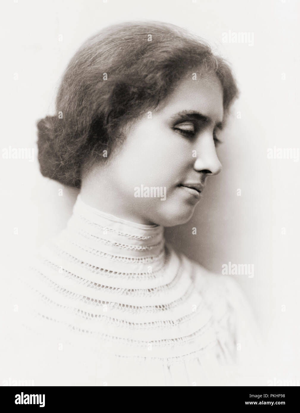 Helen Keller, 1880-1968.  Though deaf and blind, Helen Keller graduated from Harvard University’s Radcliffe College with Bachelor of Arts degree.  Her story became widely known through the play and film The Miracle Worker. Stock Photo