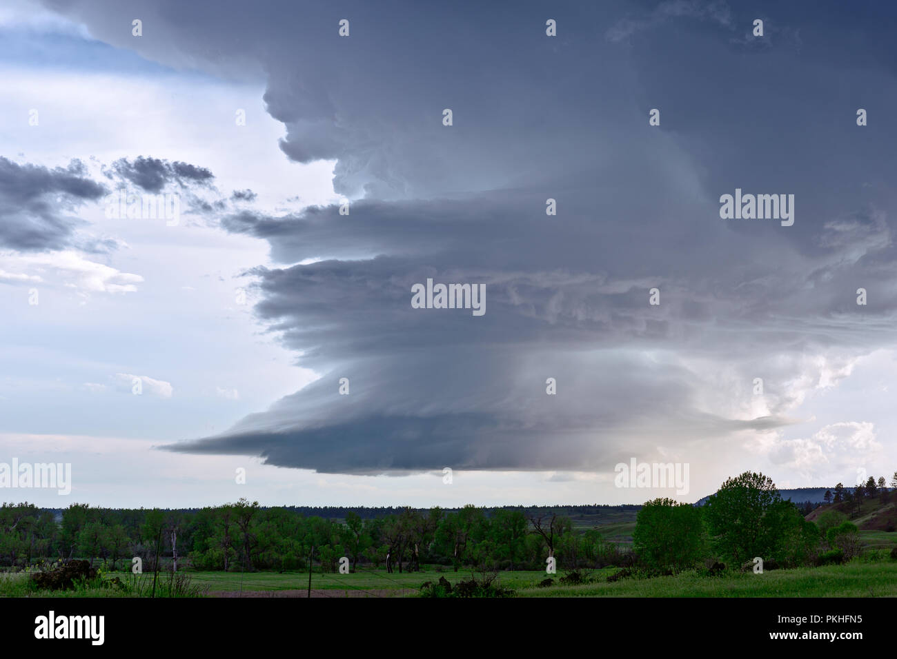 A supercell thunderstorm cumulonimbus cloud near Ashland, Montana Stock Photo