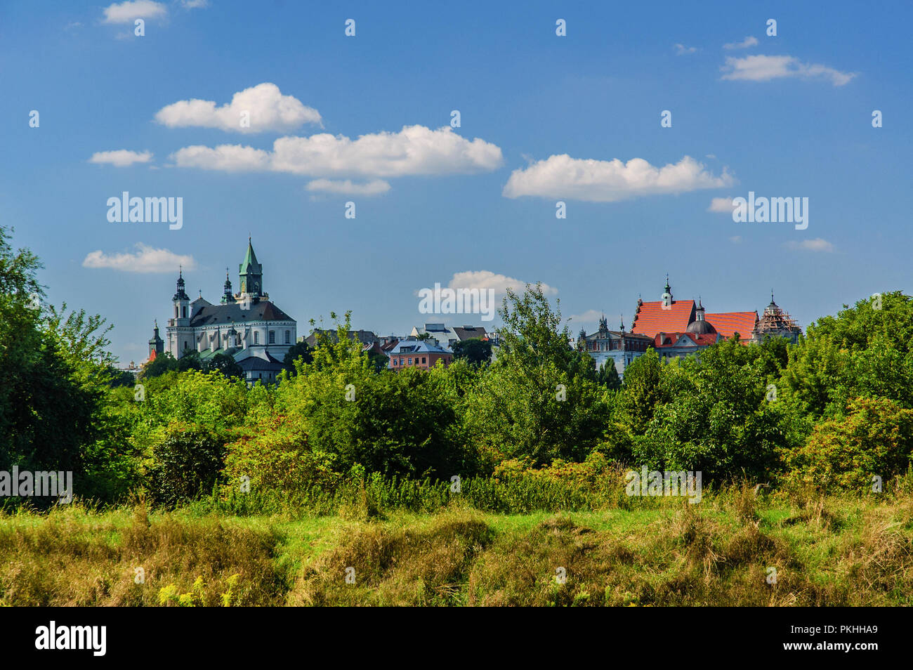 The Lublin cathedral seen from the Bystrzyca river along with the buildings of the monastery Dominican Stock Photo