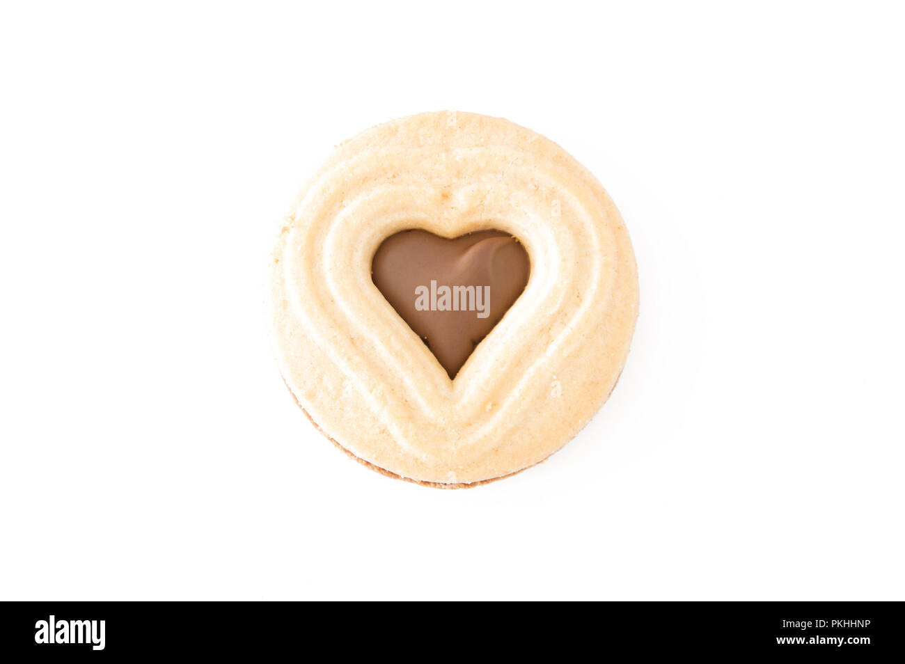 A shortbread and chocolate heart shaped cookie on a white background. Stock Photo