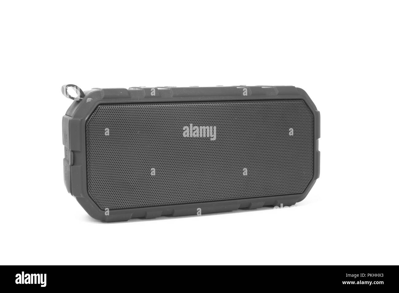 An isolated bluetooth speaker angled on a white background. Stock Photo