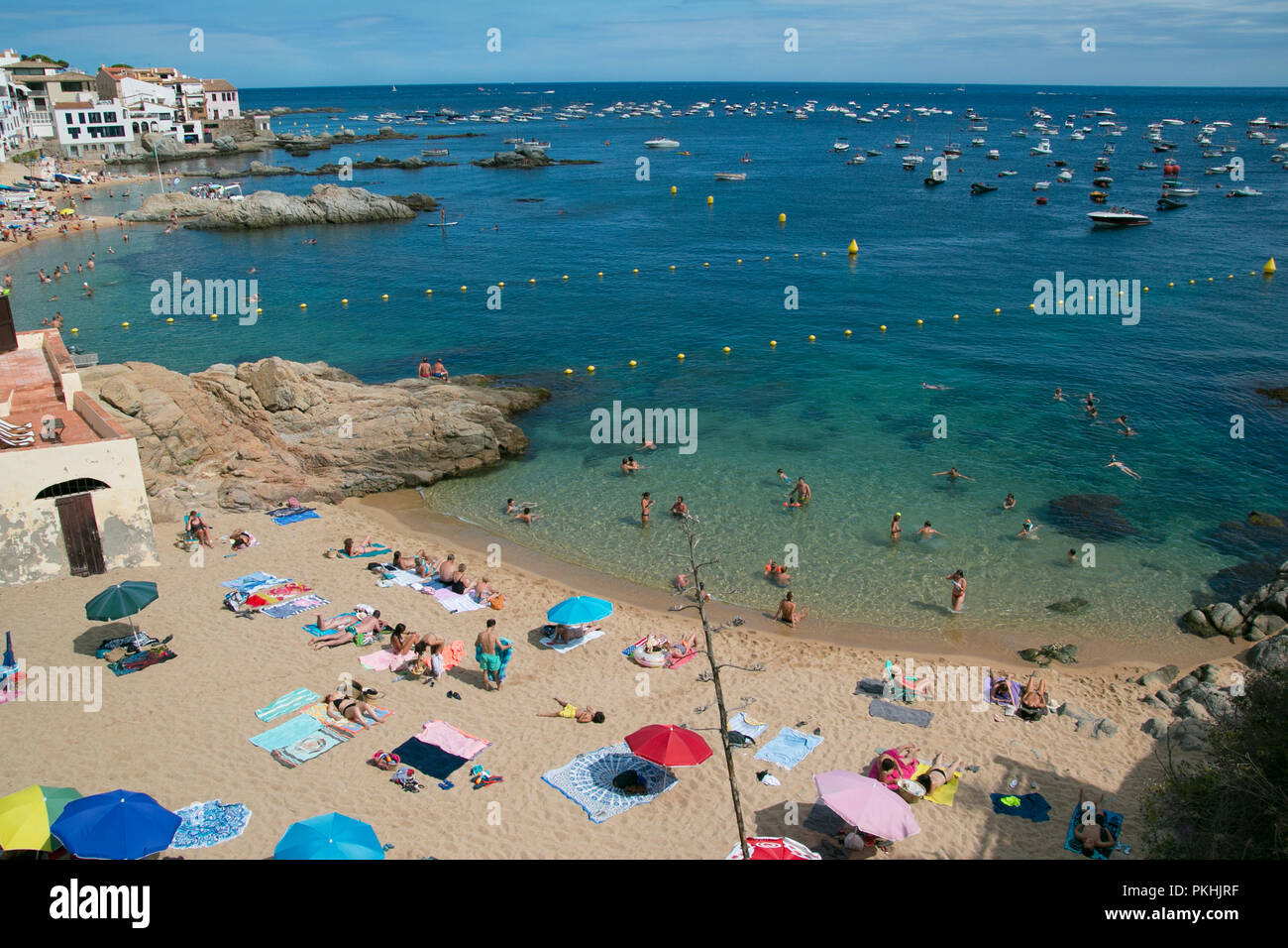 La Platjeta, one of the beaches of the charming village of Calella de palafrugell, located in costa brava, spain. View from above with people bathing Stock Photo