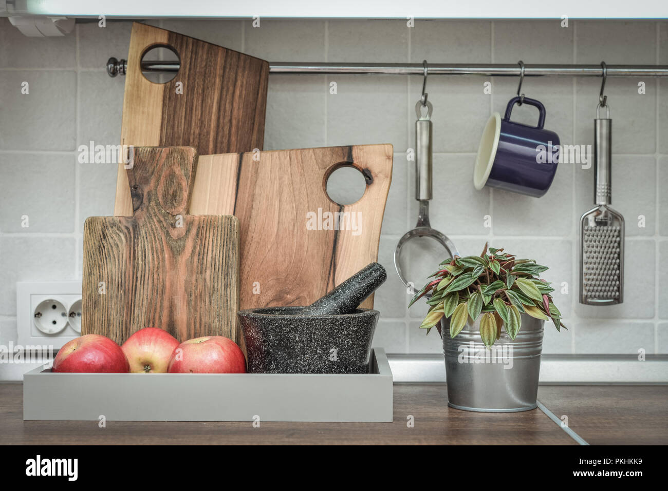 Interior of a modern domestic kitchen with cutting boards closeup Stock Photo