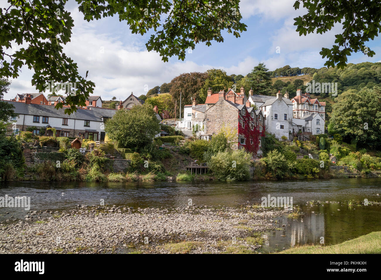 The picturesque riverside village of Carrog on the River Dee in the Vale of Llangollen, Wales, UK Stock Photo