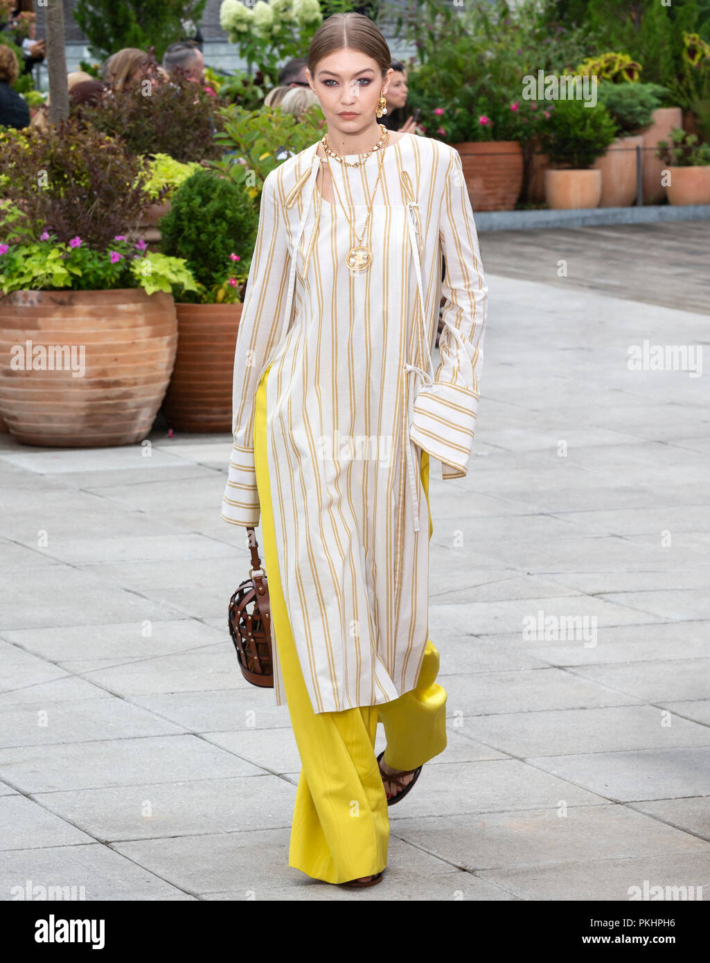 gigi hadid striped dress next in fashion All The Designer Outfits Gigi Hadid Wore In "next In Fashion" Season 2