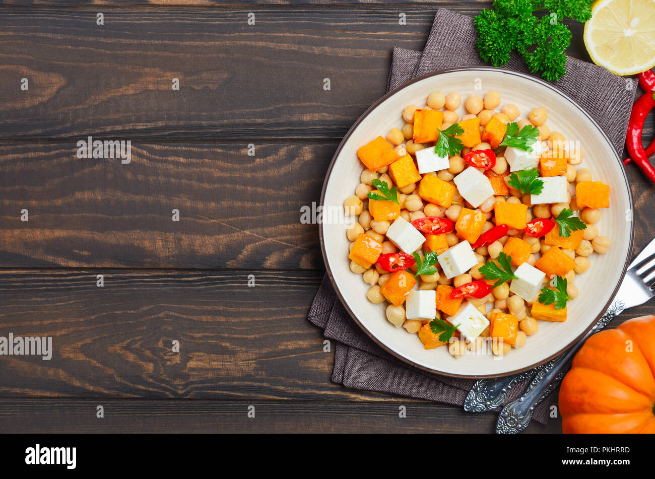 Autumnal Salad with Chickpea Pumpkin Feta Parsley and Chili Flat Lay Top View Flat Lay Stock Photo