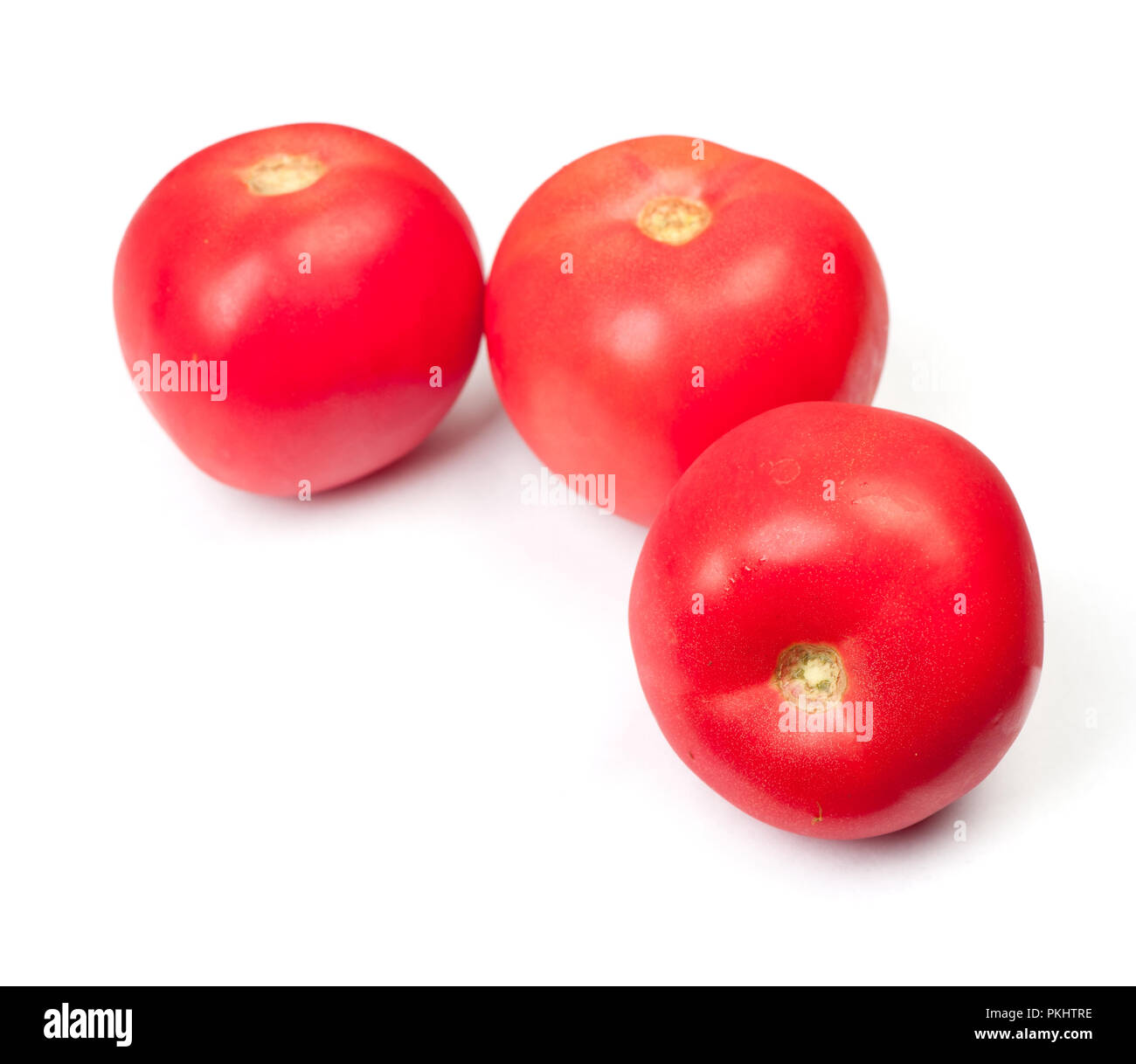 Group of red tomatoes isolated on white background Stock Photo - Alamy