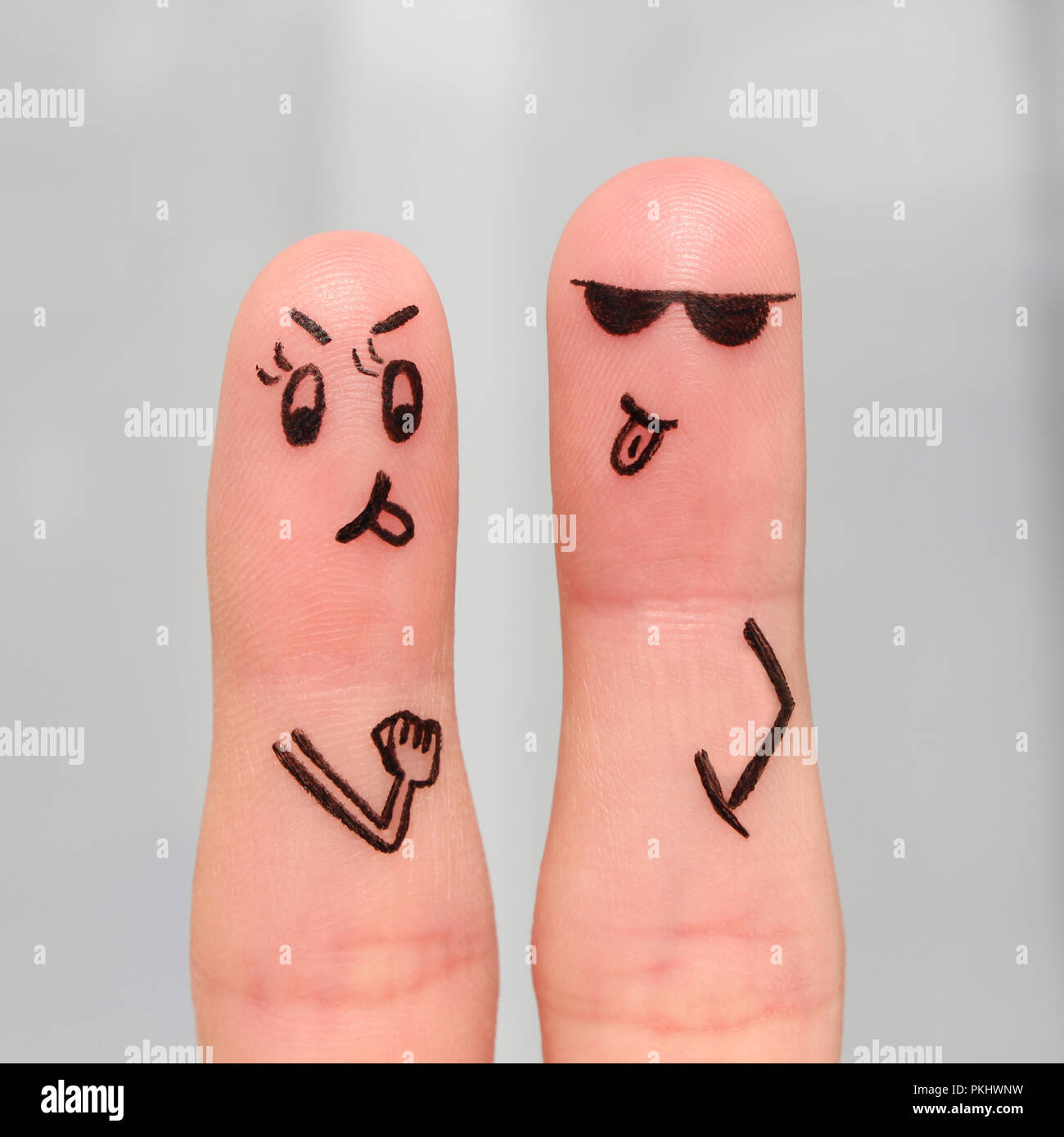 Finger art of couple. Couple of swears, shows the languages to each other. Stock Photo