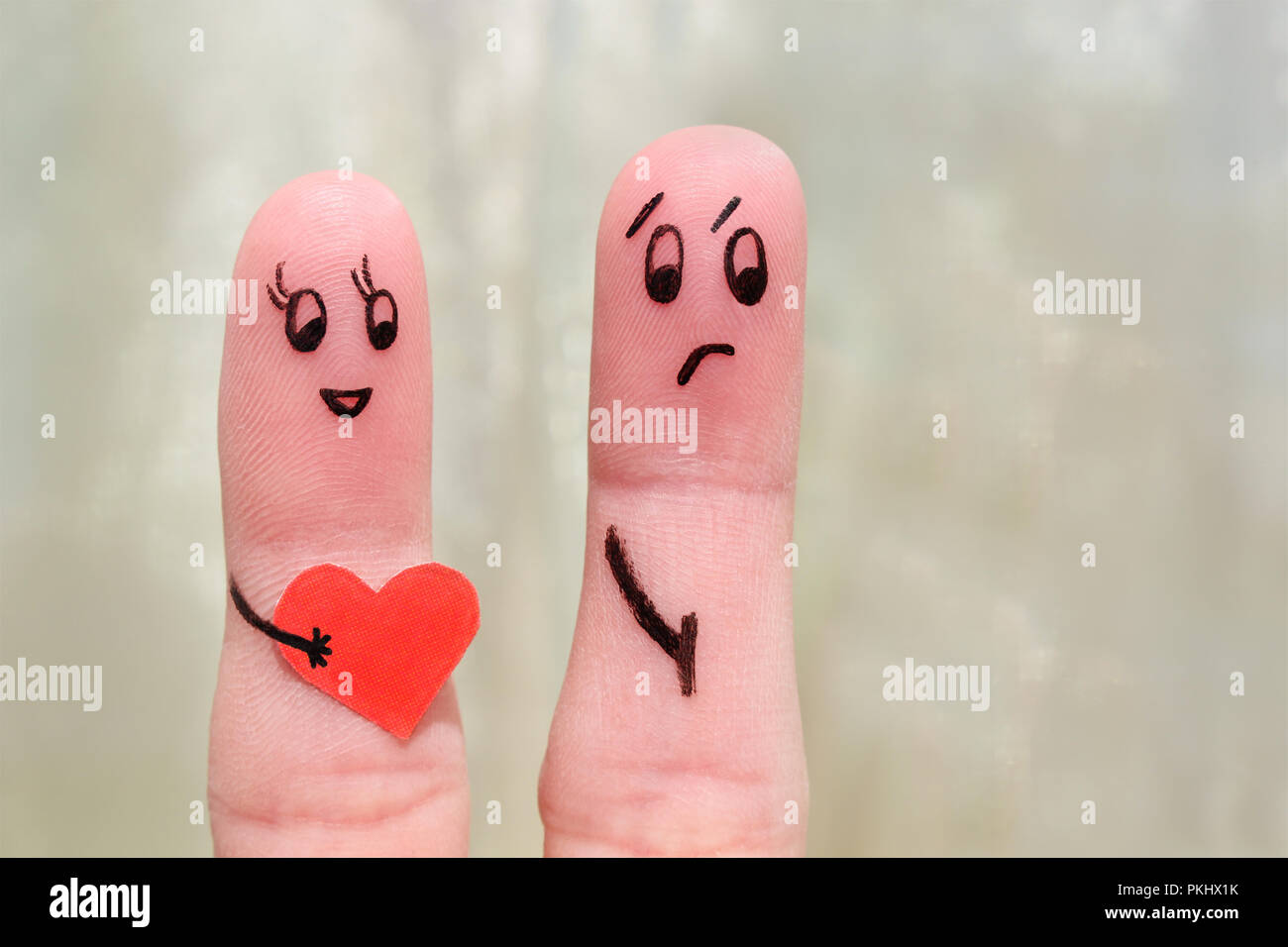 Finger art of a couple. The concept is not shared love. Stock Photo