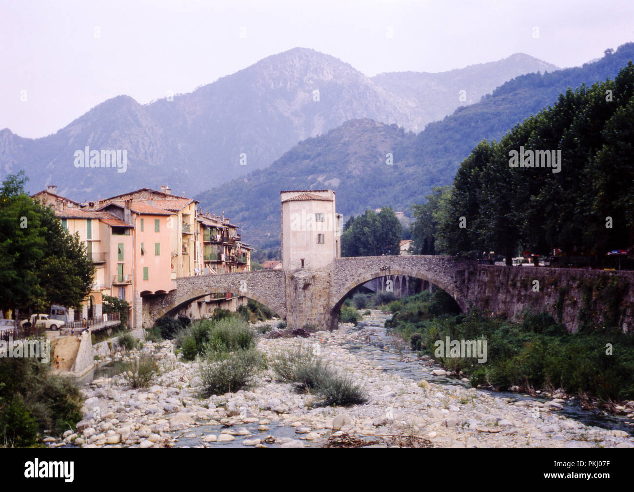 The Old Toll Bridge crossing the River Bevera in Sospel, Provence-Alpes-Côte d'Azur, France. Original archival image taken in September 1971. Stock Photo