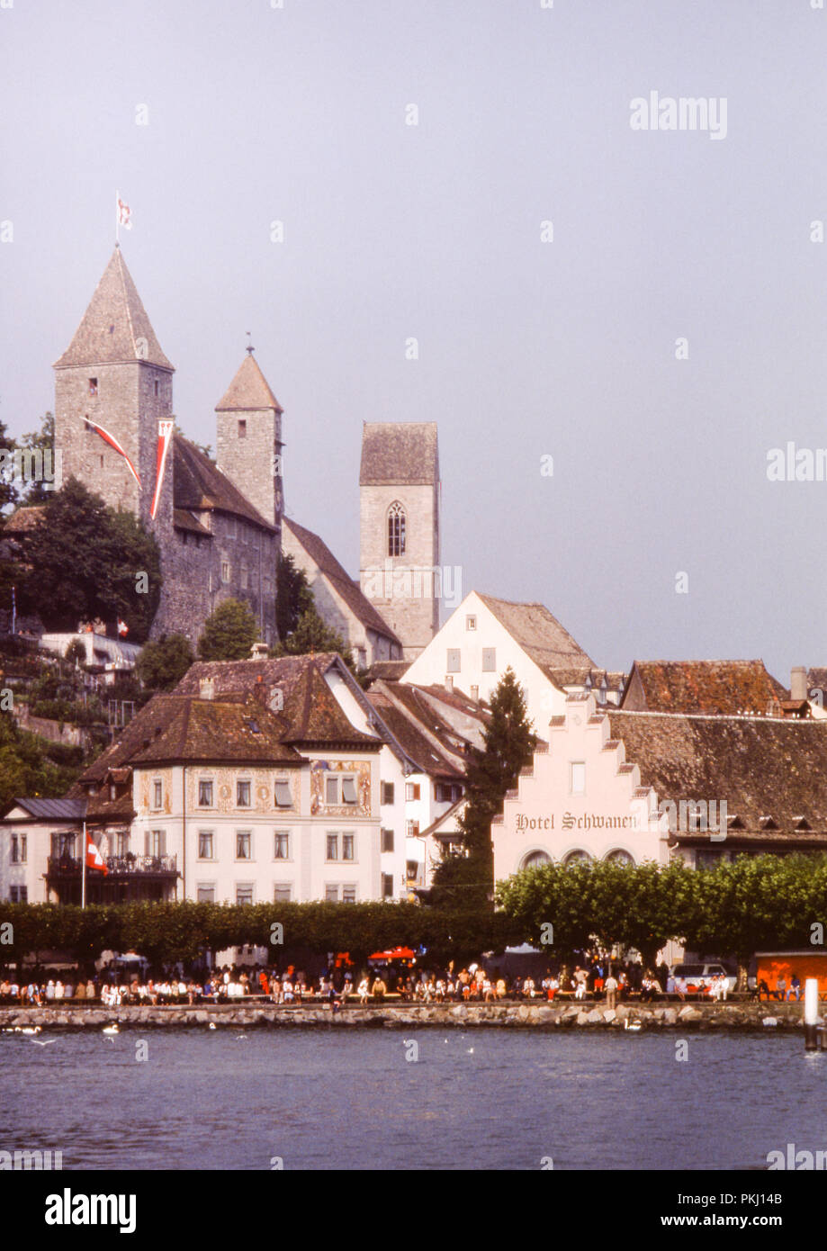 Rapperswil Harbour, Switzerland with buildings of the Einsiedlerhaus and Capuchin Monastery. Original archive photo taken in September 1975. Stock Photo