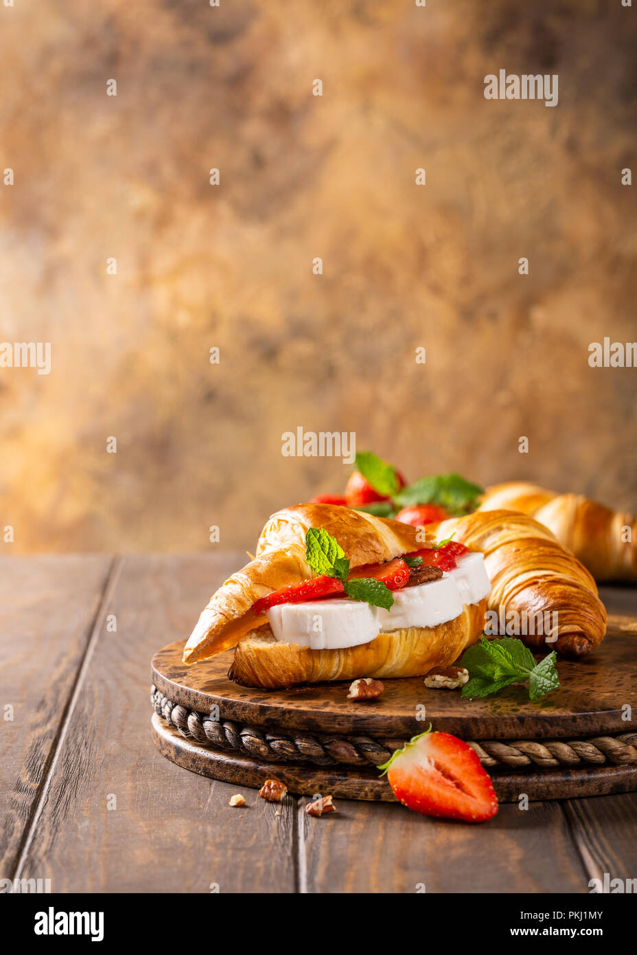 Sandwich croissant with goat cheese Stock Photo Alamy