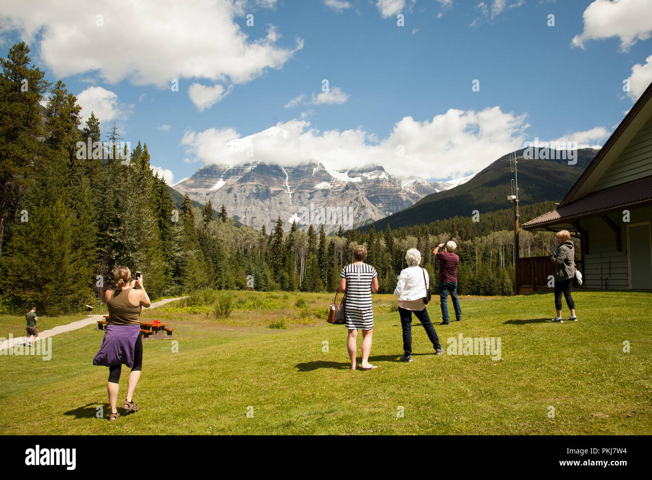 Tourists at Mount Robson Provincial Park, Canada. Stock Photo