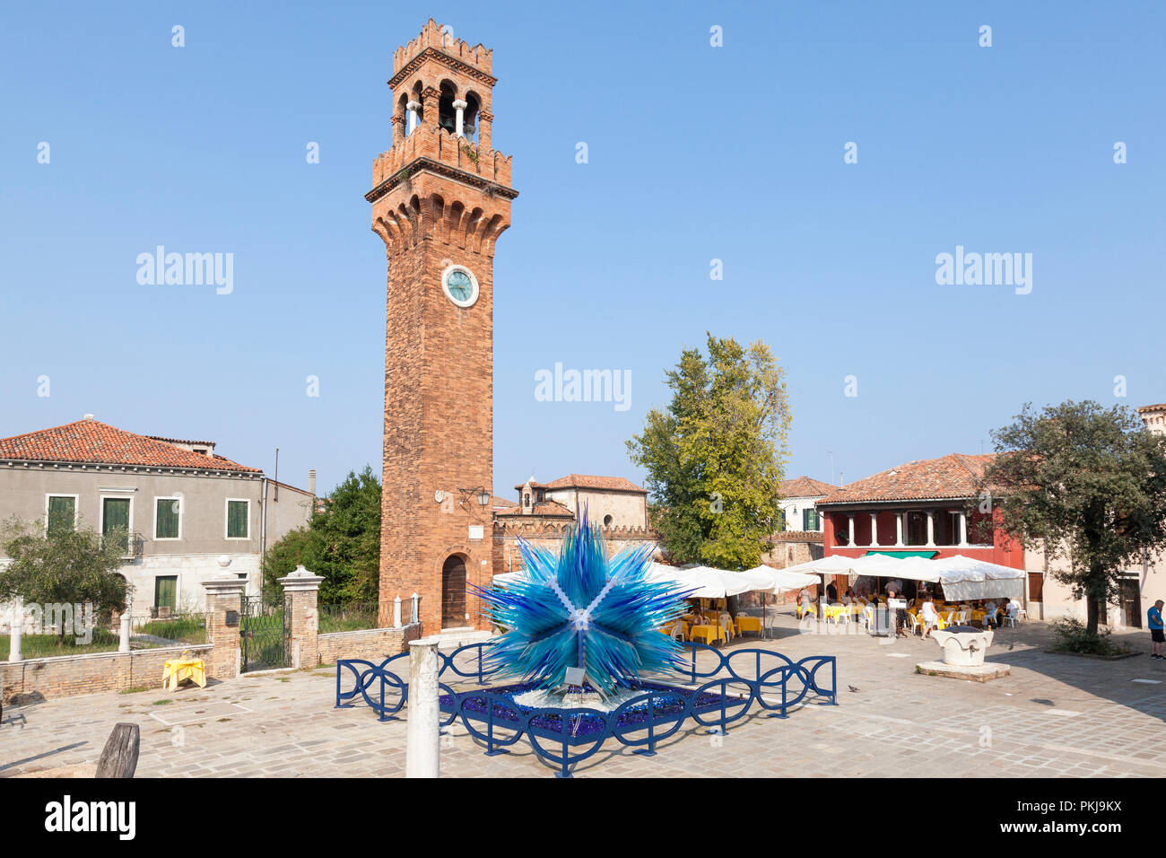 Campo Santo Stefano, Murano, Venice, Veneto, Italy with the blue Murano glass Cometa di Vetro by Simone Cenedese and people at restaurants Stock Photo