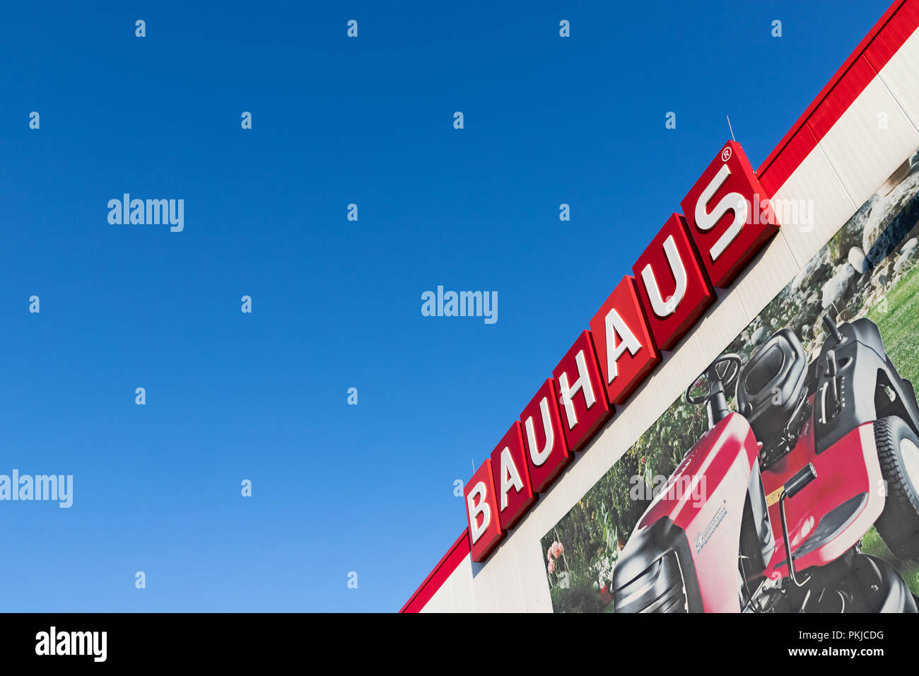 Bauhaus sign at branch. Bauhaus is a Swiss-headquartered pan-European retail chain offering products for home improvement, gardening and workshop. Stock Photo