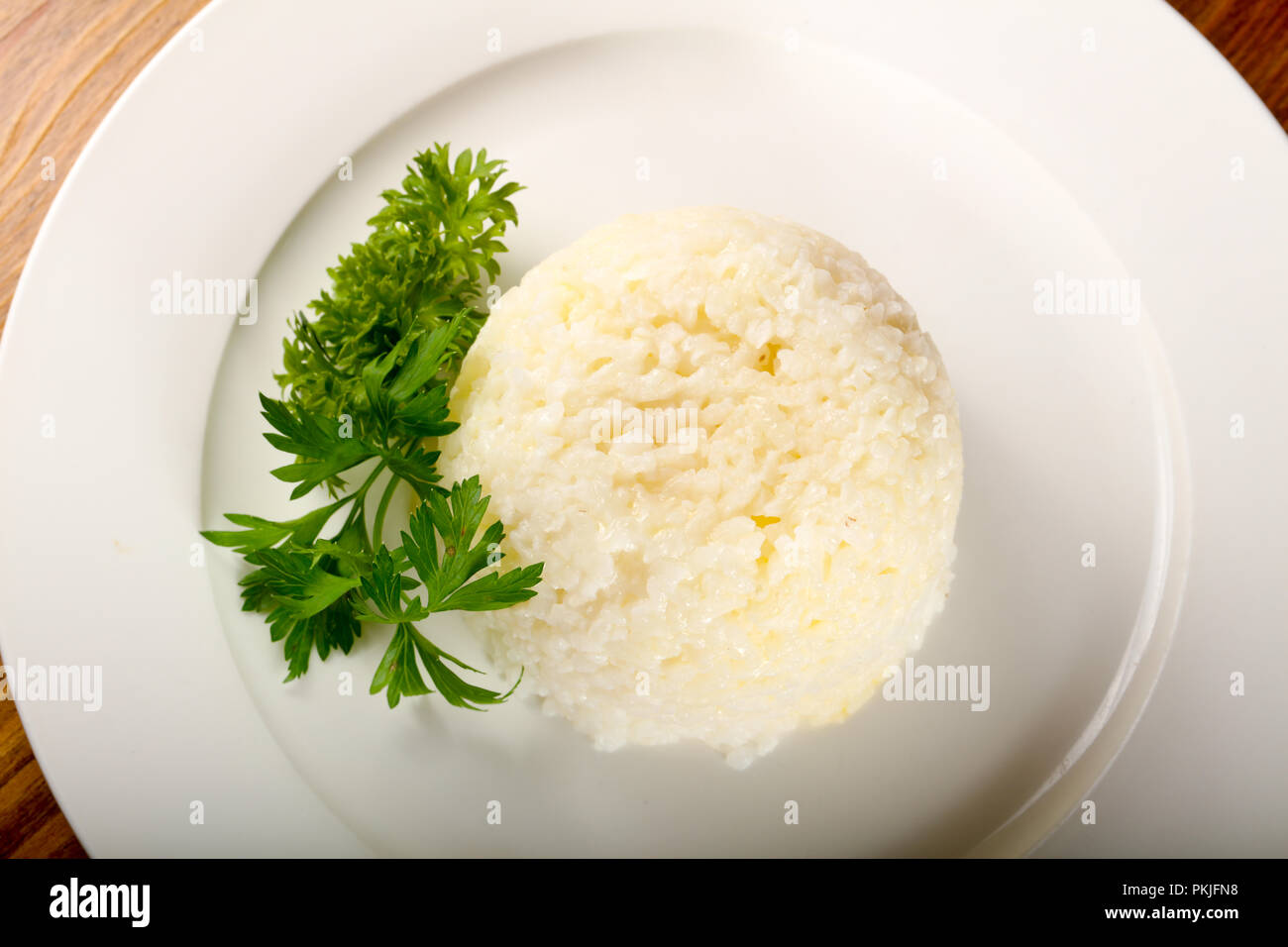 Steamed rice with parsley Stock Photo - Alamy