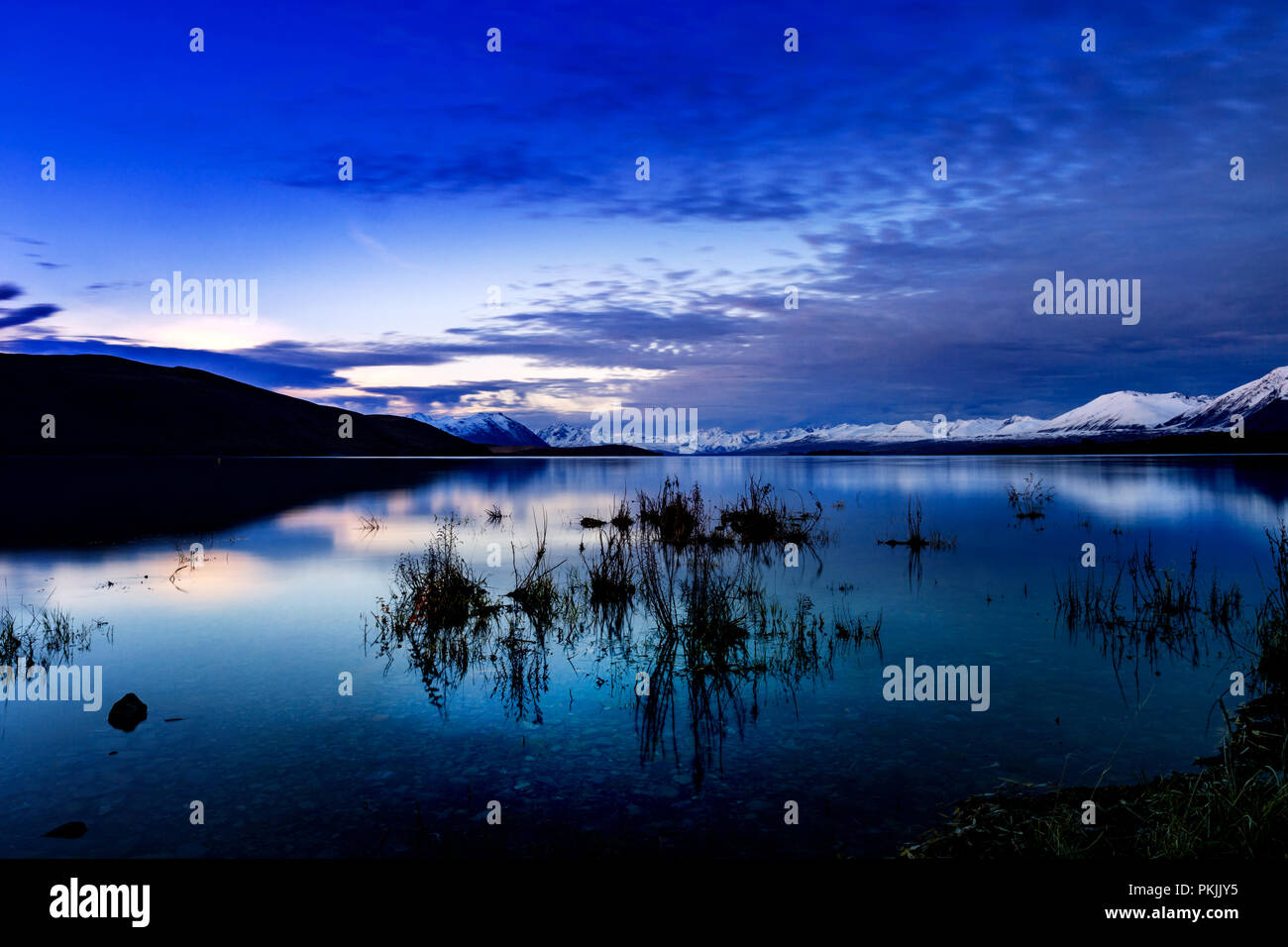 Sunset at Lake Tekapo, New Zealand landscape Stock Photo - Alamy