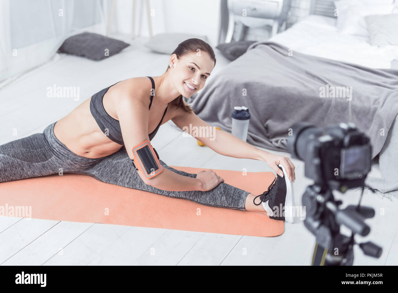 Active joyful woman enjoying her fitness workout Stock Photo
