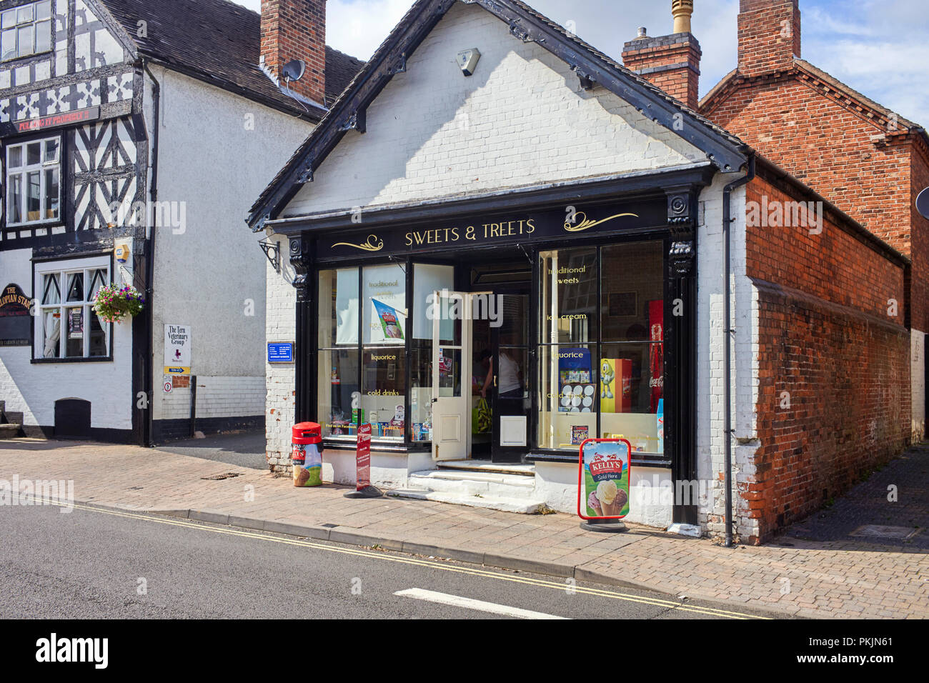 Sweets and treets shop selling sweets, ices and drinks in Market Drayton town centre Stock Photo