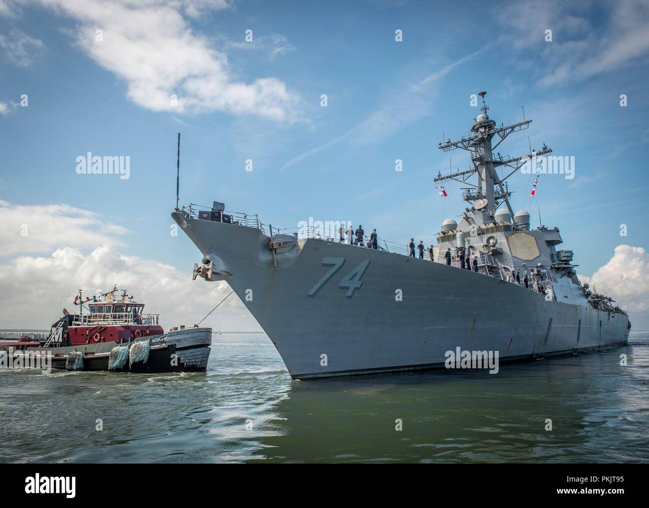 The U.S. Navy guided-missile destroyer USS McFaul departs Naval Station Norfolk in preparation for possible impact to the region by Hurricane Florence September 11, 2018 in Norfolk, Virginia. Commander, U.S. Fleet Forces Command ordered all Navy Ships in the Hampton Roads area to head south away from the oncoming storm to prevent damage to the fleet. Stock Photo