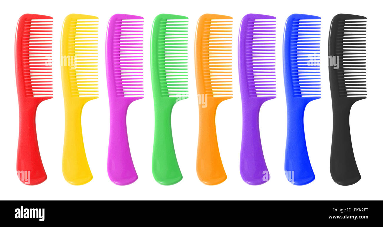 Colored hair combs with glitter finish isolated on a white background Stock Photo
