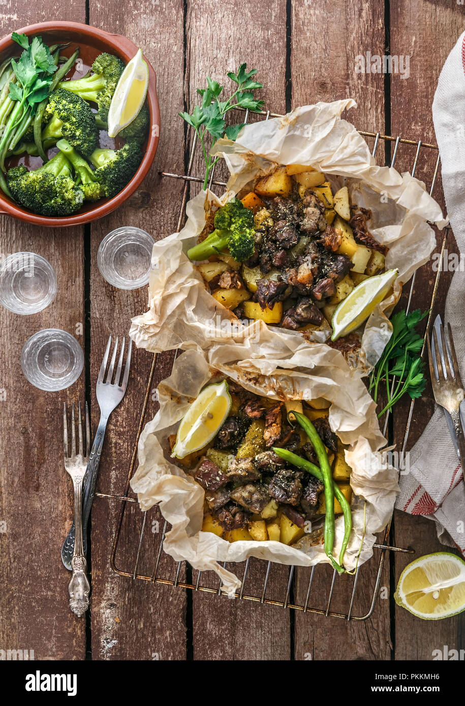 Traditional Greek kleftiko, an ovenbaked lamb stew with potato, olive