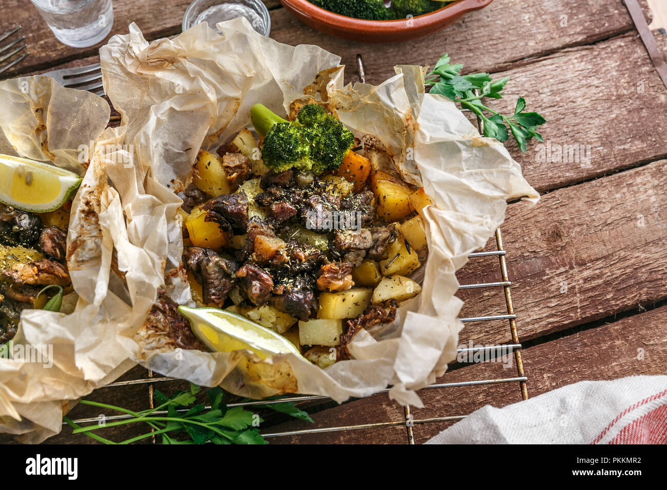 Traditional Greek kleftiko, an ovenbaked lamb stew with potato, olive