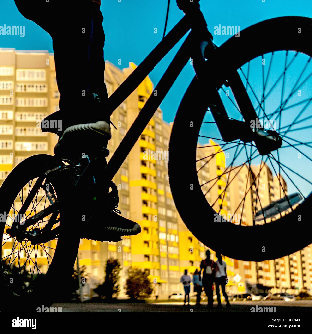 Extreme BMX Freestyle Riding. Blurred Sunset Cityscape, Passersby Stock  Photo - Alamy