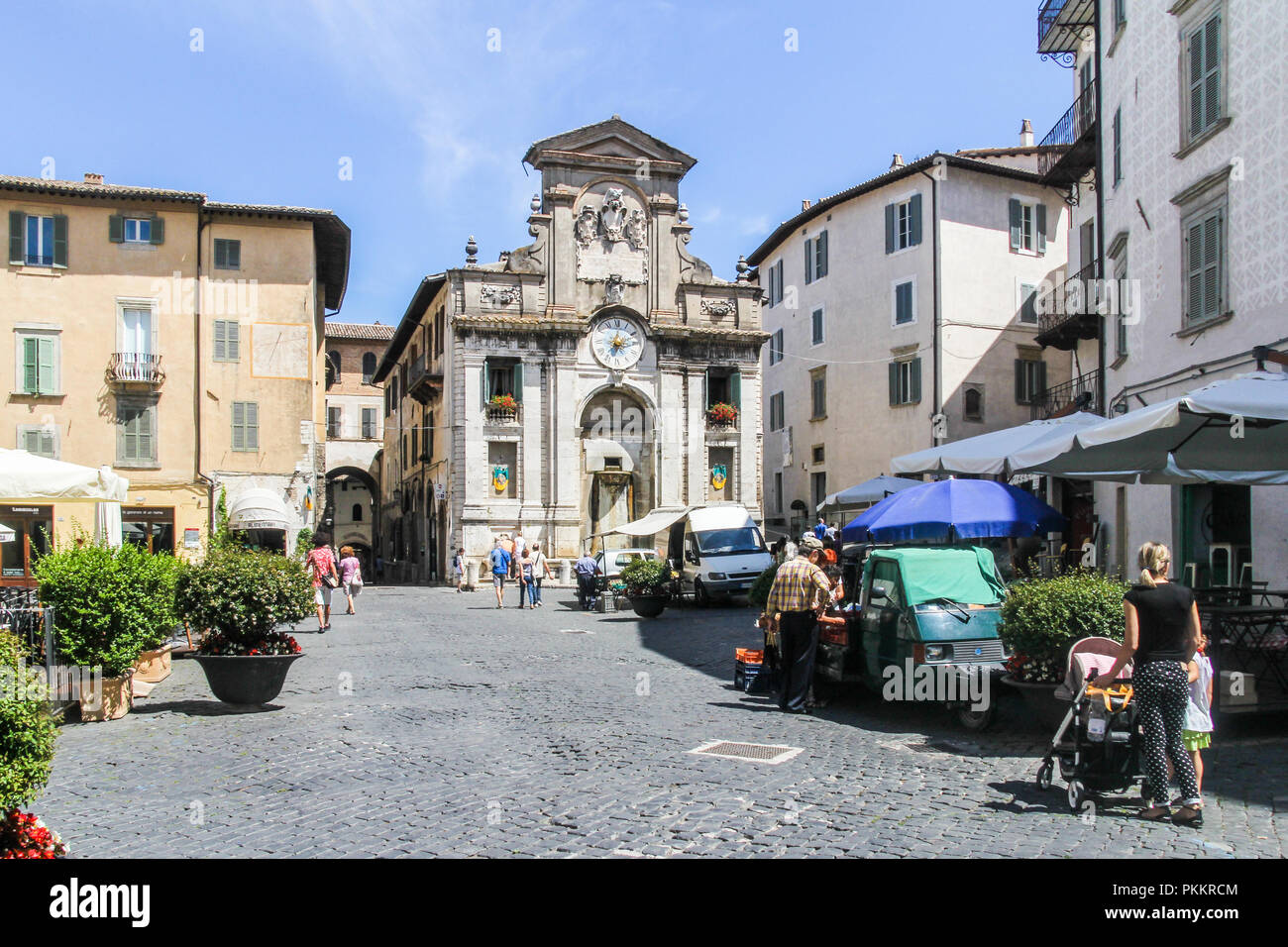Spoleto, Italy - 2nd August 2016:  The town hall building with clock. The building dates from the 17th century. Stock Photo