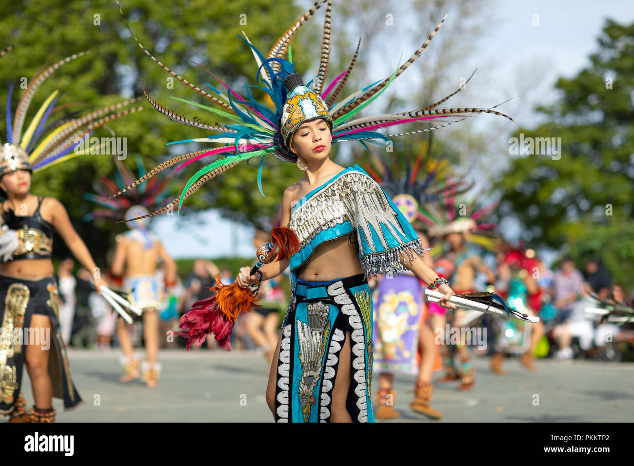 Milwaukee, Wisconsin, USA - September 8, 2018 The Indian Summer Festival: Men women and children members of the Dance Academy of Mexico performing Azt Stock Photo