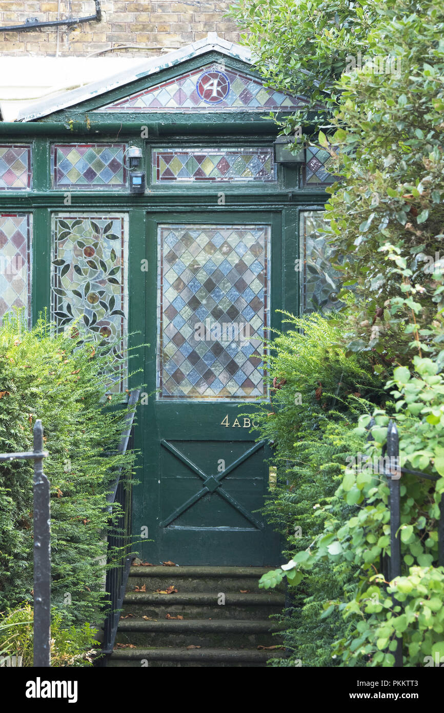 The front of an unusual house in Keat's Grove, with a conservatory