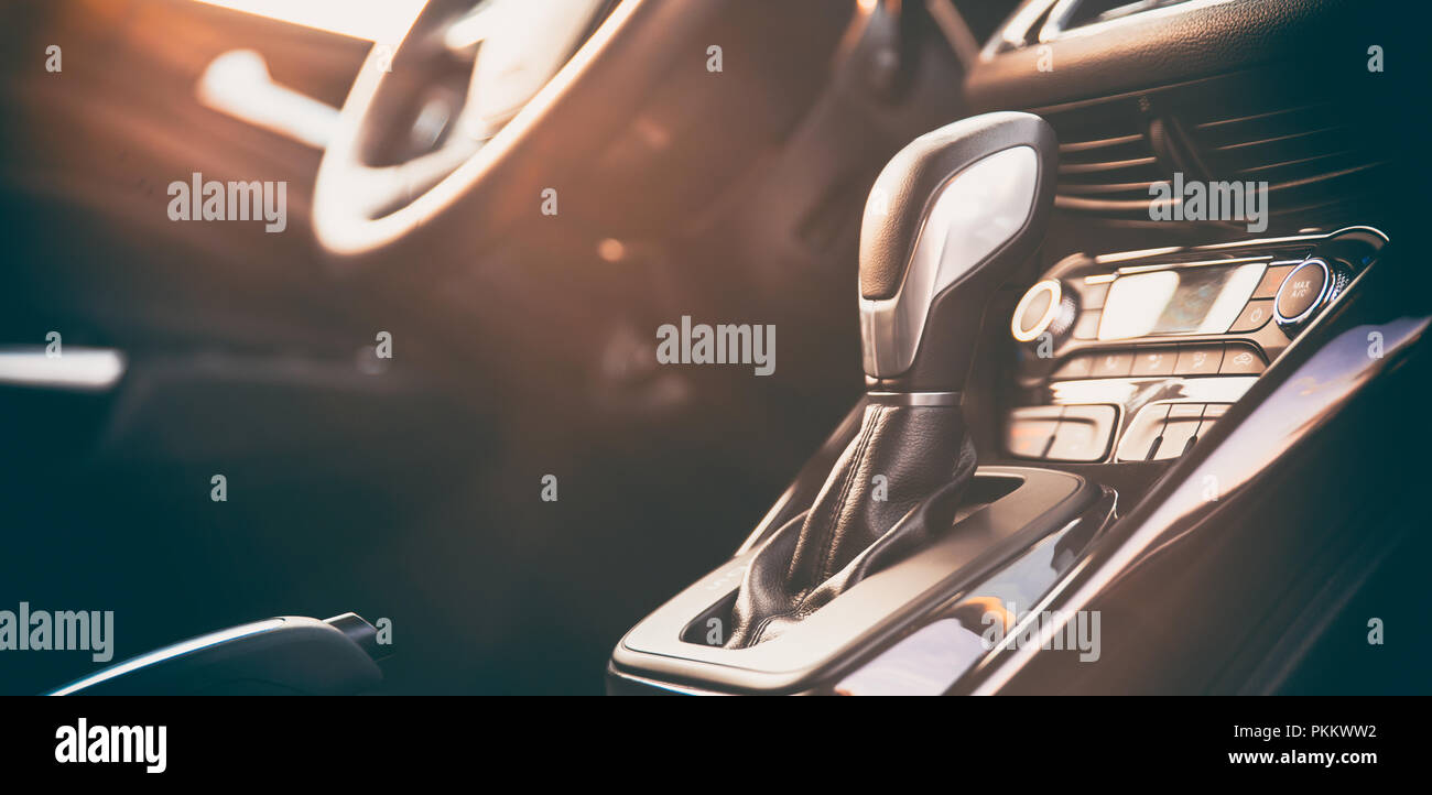 Modern car Interior automatic transmission, steering wheel. Wide