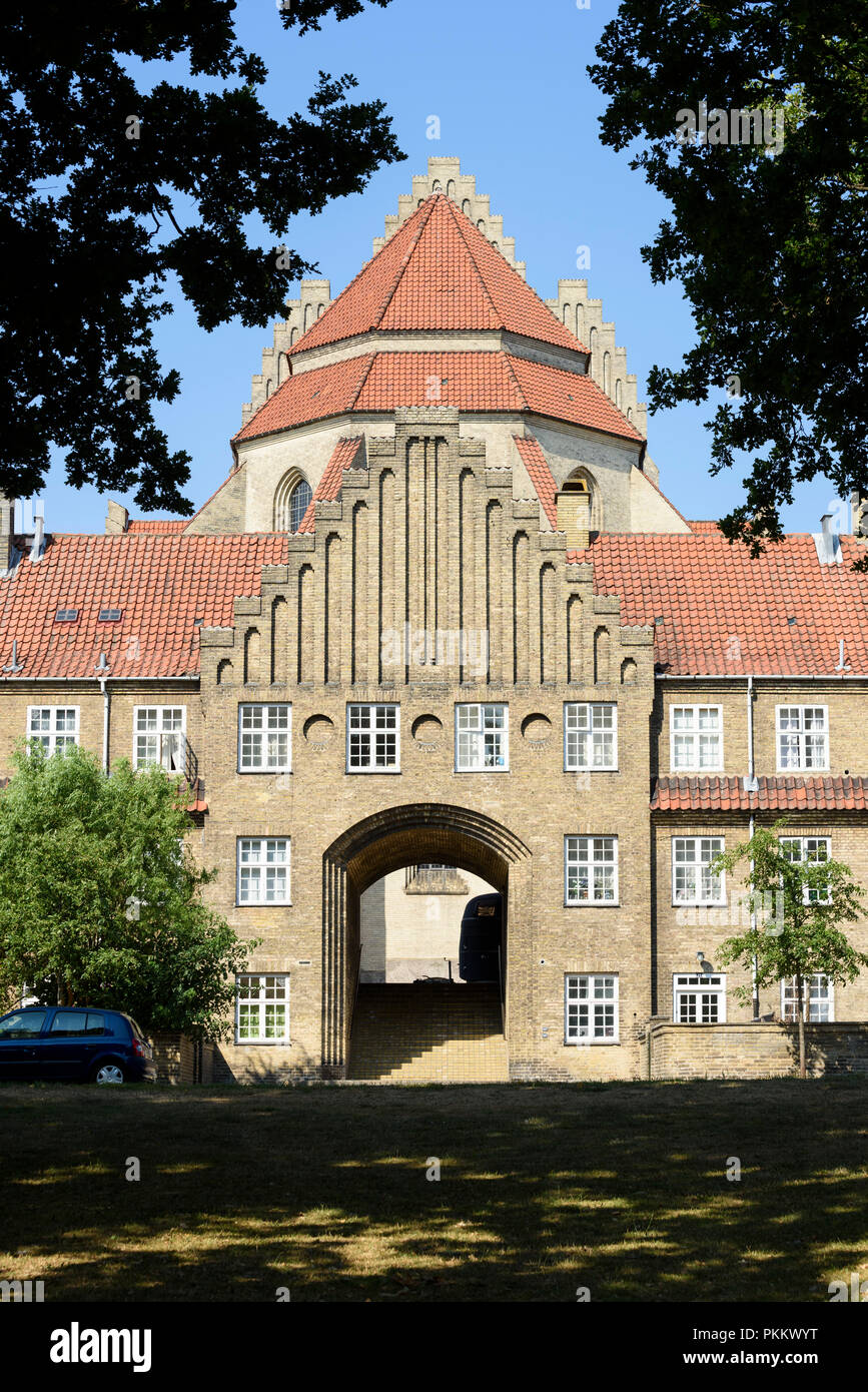 Copenhagen. Denmark. Grundtvig's Church, rear view with surrounding houses. Designed by Danish architect Peder Vilhelm Jensen Klint (1853-1930) 1913,  Stock Photo