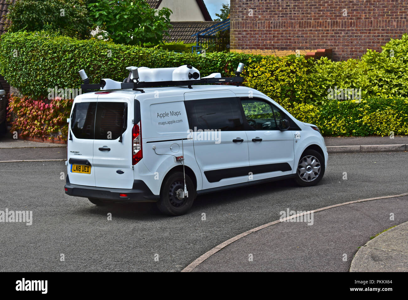 Apple Maps van seen in residential area of Bridgend S.Wales, gathering data  to produce a rival to Google's Street View Stock Photo - Alamy