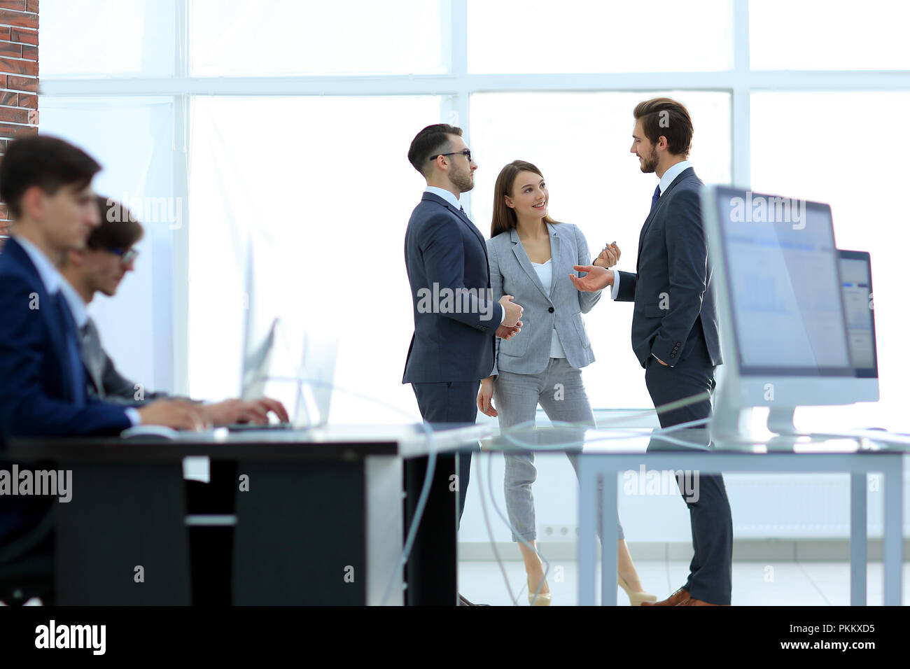 Young business crew working with startup modern office. Stock Photo