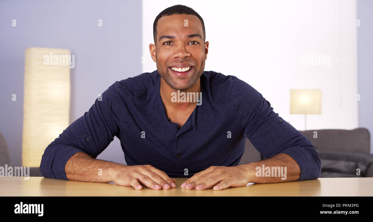 Happy african man talking video hi-res stock photography and images - Alamy