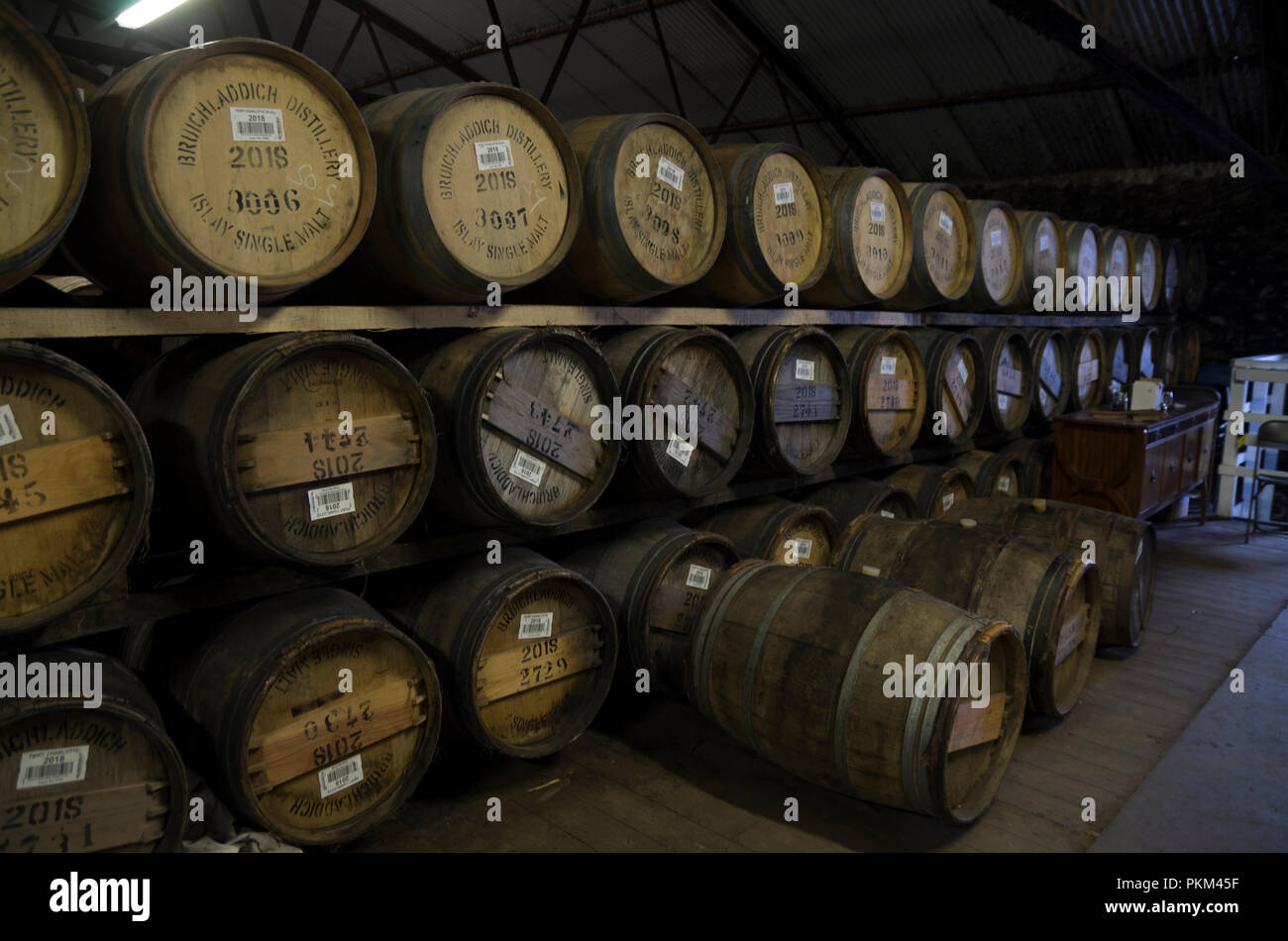 Oak Barrels of Whisky in Warehouse, Islay, Scotland, UK Stock Photo