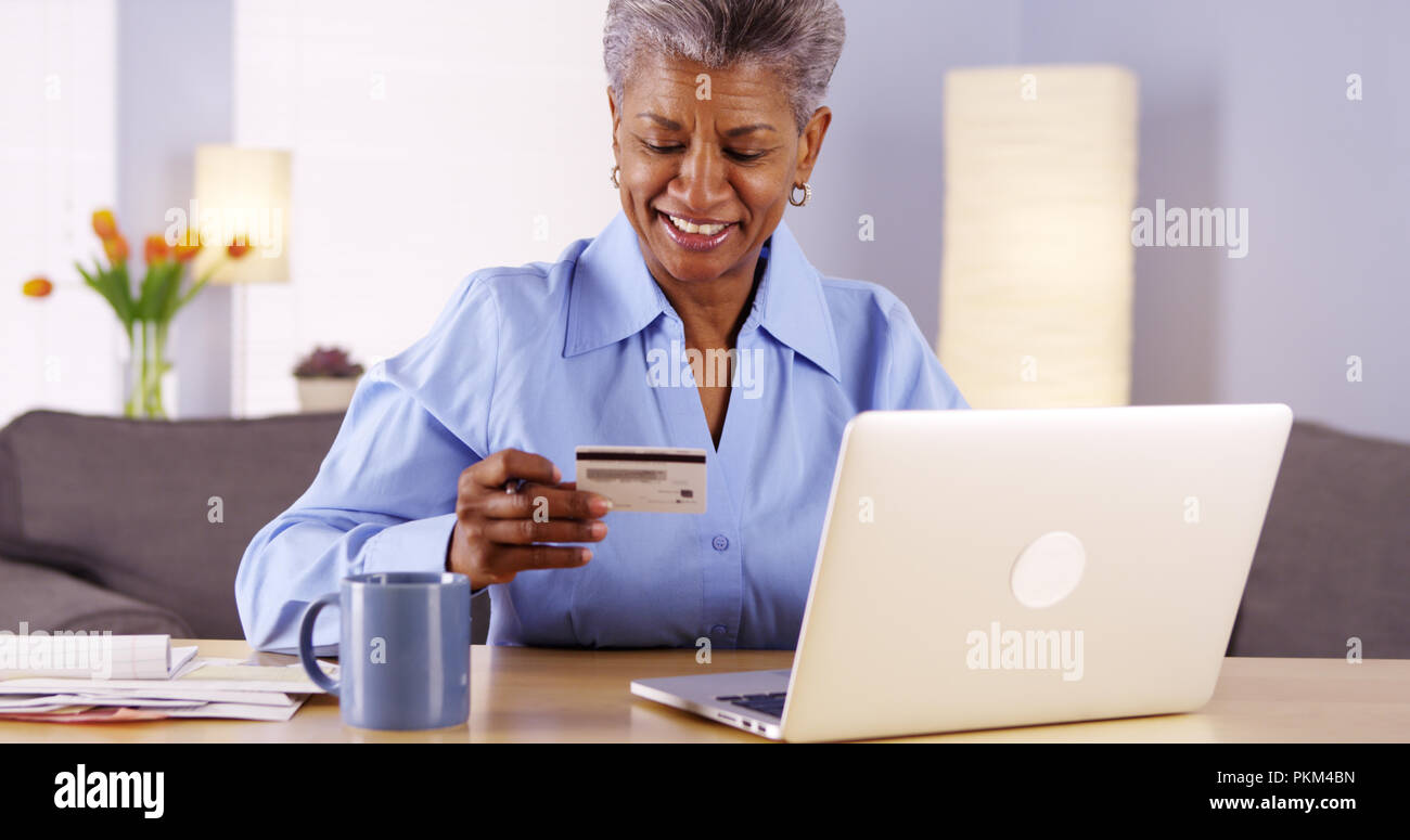 Senior woman managing finances hi-res stock photography and images - Alamy
