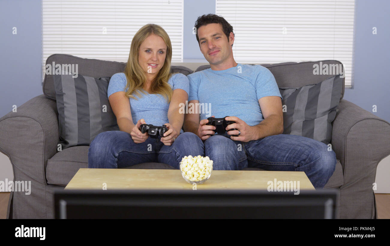 Cute couple playing video games hi-res stock photography and images - Alamy