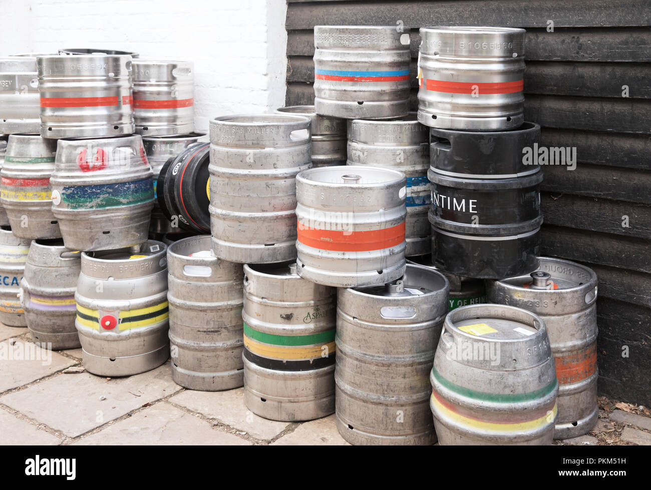 StAlbas, United Kingdom - 27 July 2017: A lot of Beer kegs near old British pub Stock Photo