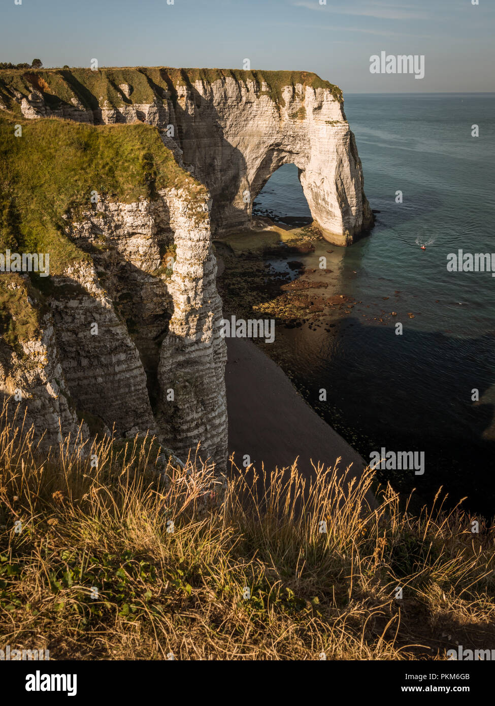 Chalk cliffs of Etretat (Normandy France) with the natural arch called ...