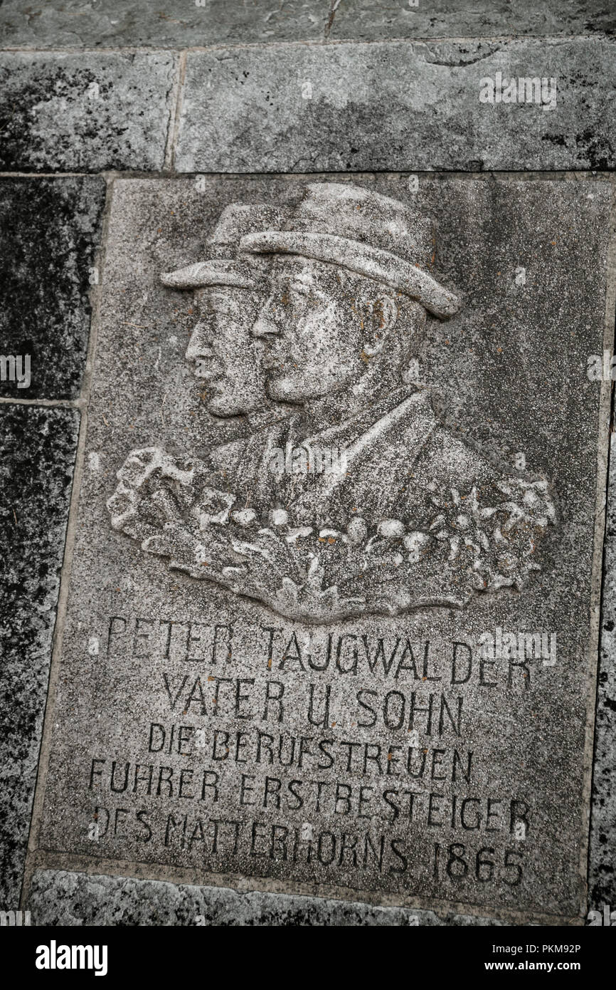 Tombstone of father and son Taugwalder, mountain guides during the first ascent of the Matterhorn on 14 July 1865. Cemetery for mountain climbers. Zer Stock Photo