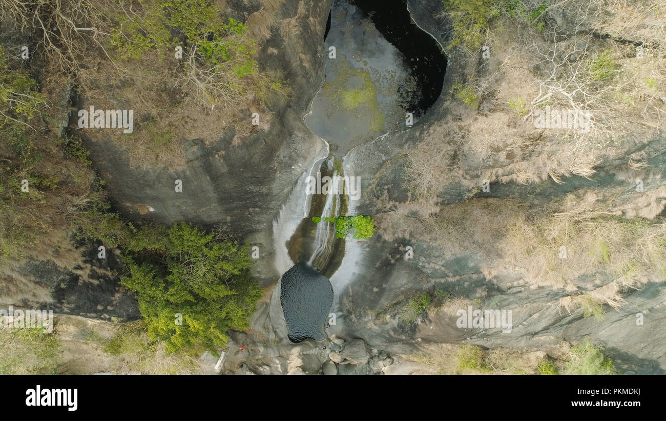 Aerial view of waterfall in the mountains of Filipino cordillera