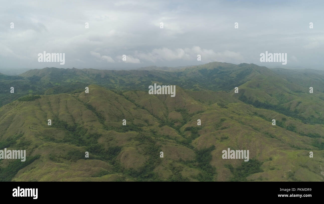 Aerial view of mountains covered forest, trees. Cordillera region