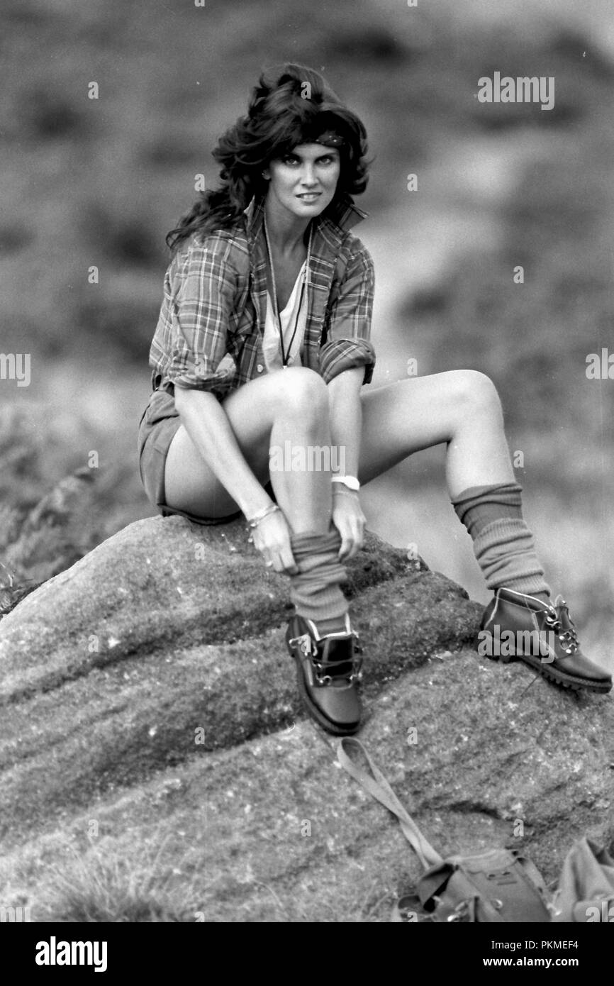 Ilkley Moor, Yorkshire, UK. 1st October 1984. Bond girl Caroline Munro in a shot from autumn 1984 models on Yorkshire's famous Ilkley Moor. Caroline featured in The Spy Who Loved Me, and At The Earth's Core and numerous scream queen films. Stock Photo