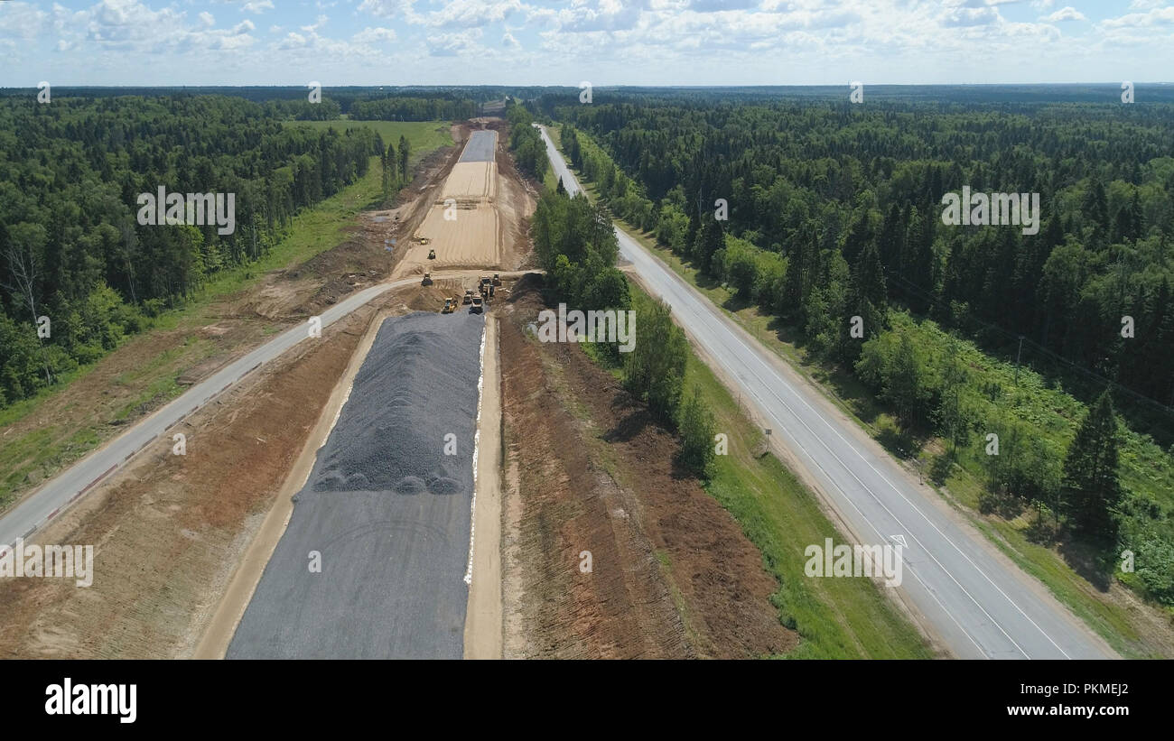 Construction of toll roads in rural areas. Aerial view construction of
