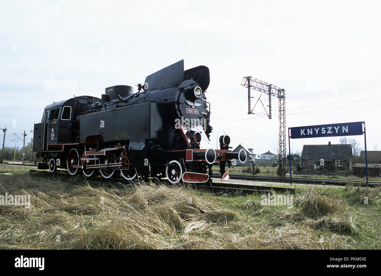 Disused steam locomotive by the train station in town of Knyszyn in Mazury region of Poland May 2008 Stock Photo