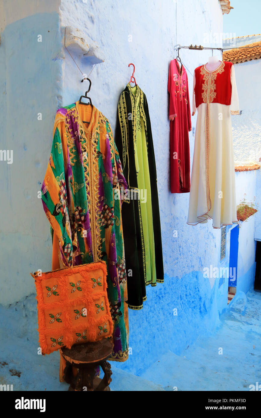 Beautiful traditional Moroccan woman dresses exposed for sale on a nice street in the medina of